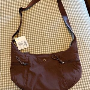 lululemon athletica brown crossbody bag with zip pockets